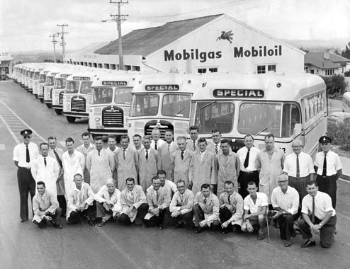 Staff and Directors of Birkenhead Transport Ltd in front of line up of Bedford Buses in November 1960